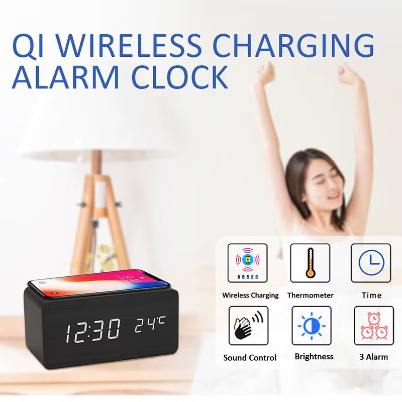 A wooden LED digital desk alarm clocks featuring Qi wireless charging pads built into their top surfaces